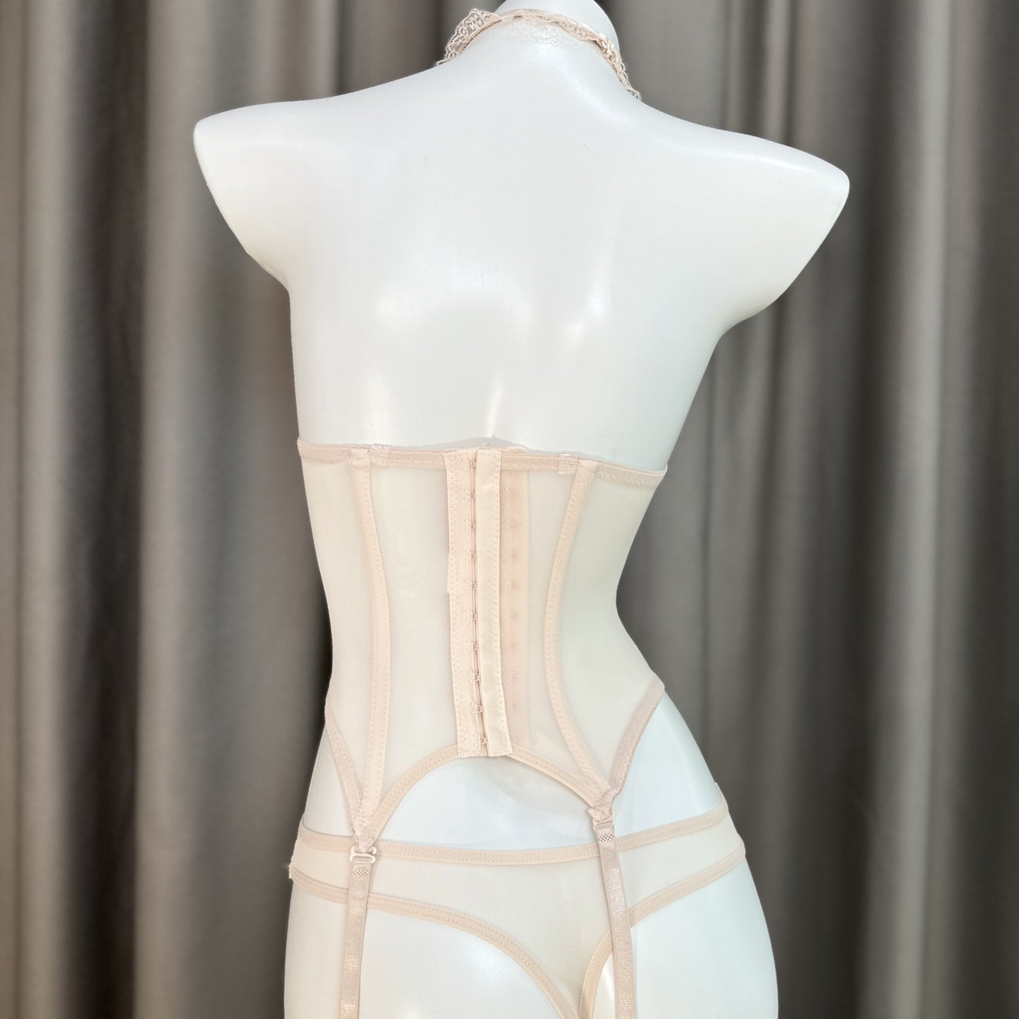 Back view of Sweet Boned lingerie set showcasing adjustable straps and hook closure