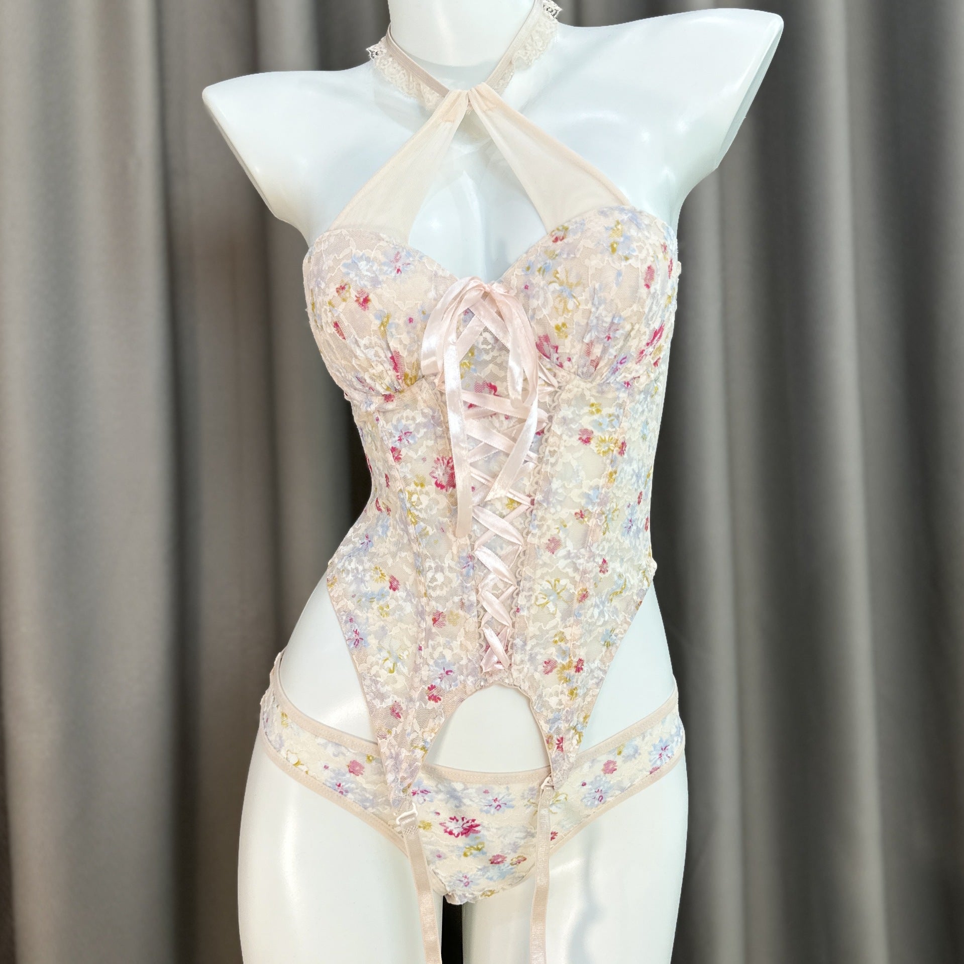 Close-up view of floral lace detailing on Sweet Boned bustier set showing intricate pattern